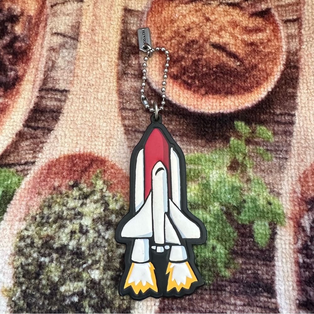 Coach leather Rocket ship NASA hang tag